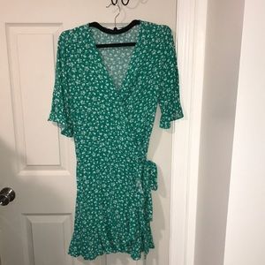 Wrap mini dress in green floral